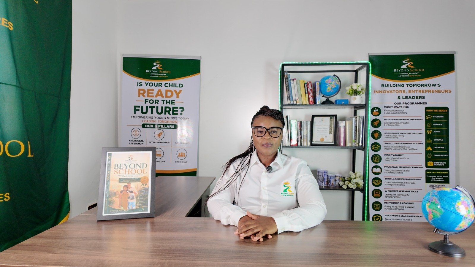 Yvonne Sibanda, Founder of Beyond School Futures Academy, at her desk
